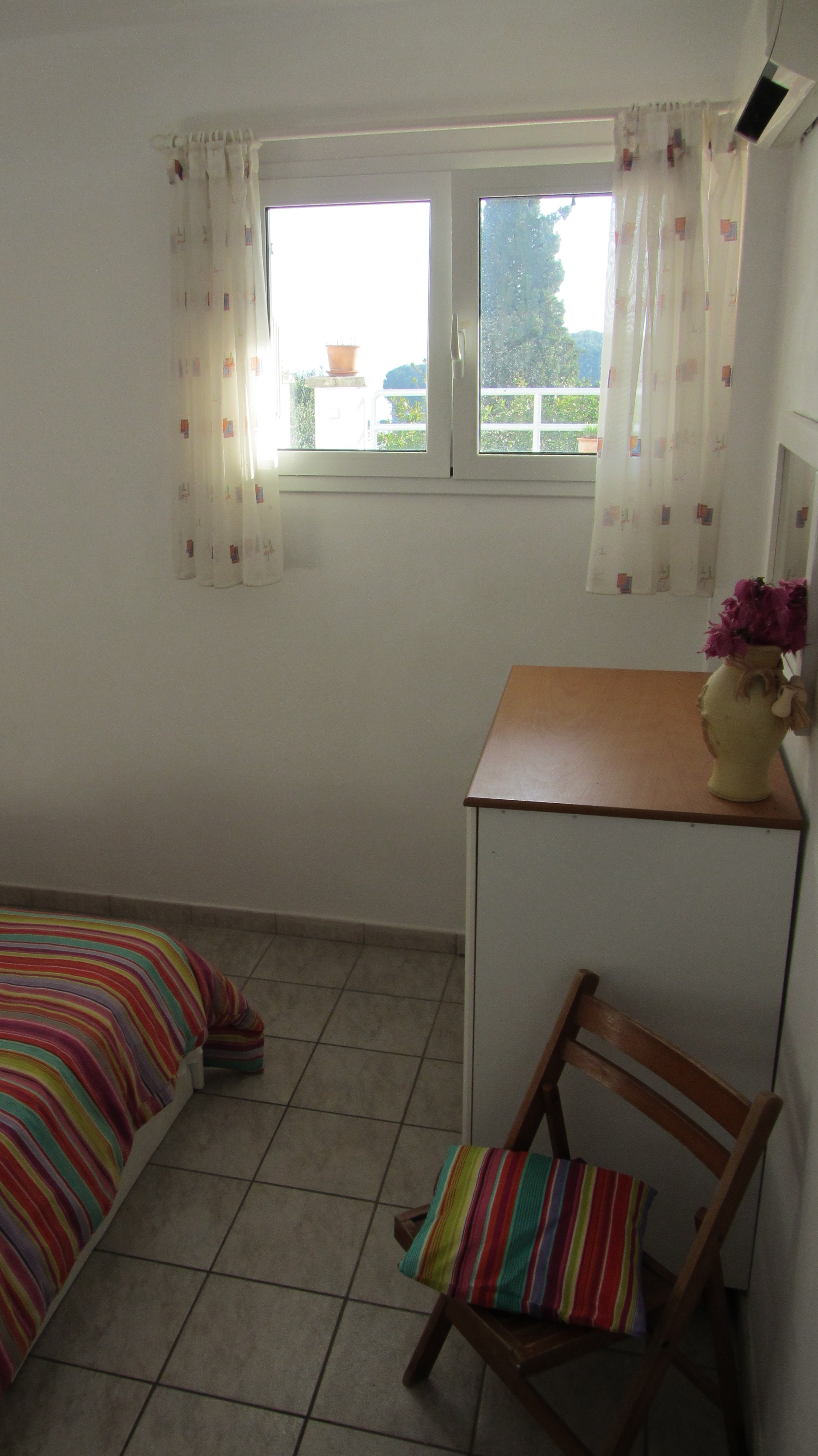 Zweites Schlafzimmer mit Gartenblick